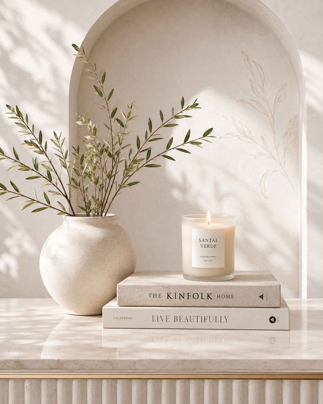 Calm styling with vase, candle, and books